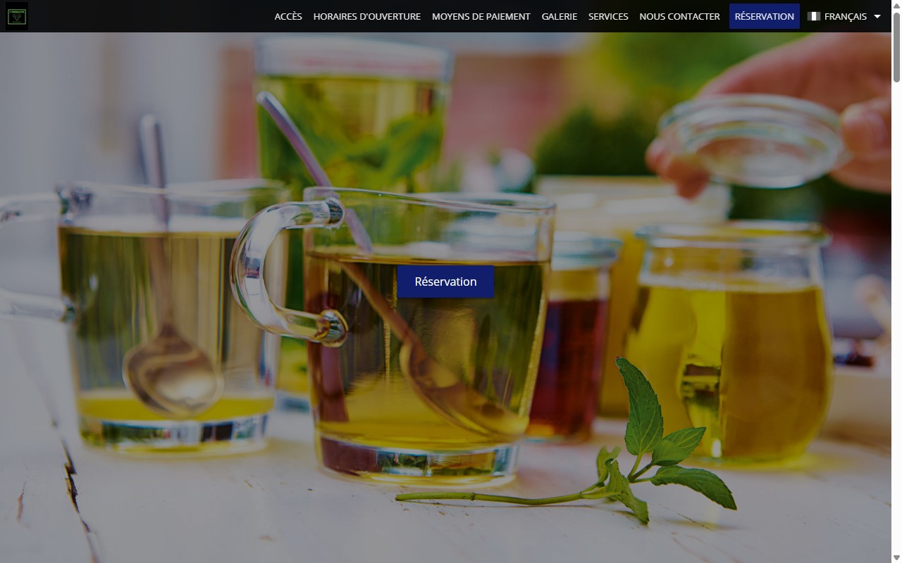 Ancien site de L'Émeraude : template eatbu générique, photo standard et bouton Réservation, sans identité.